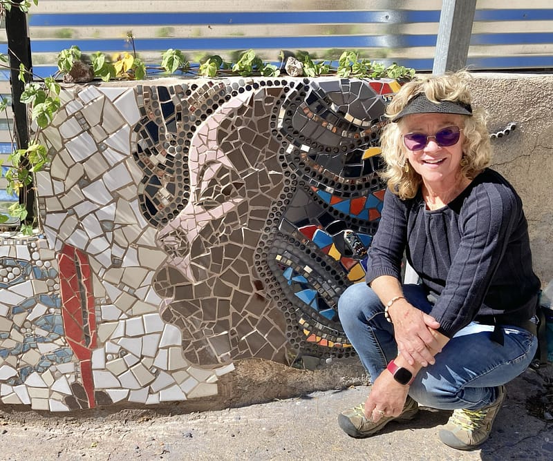 A colorful public mural in Bisbee by Tamara Thomas, demonstrating her commitment to traditional craftsmanship in a community setting.